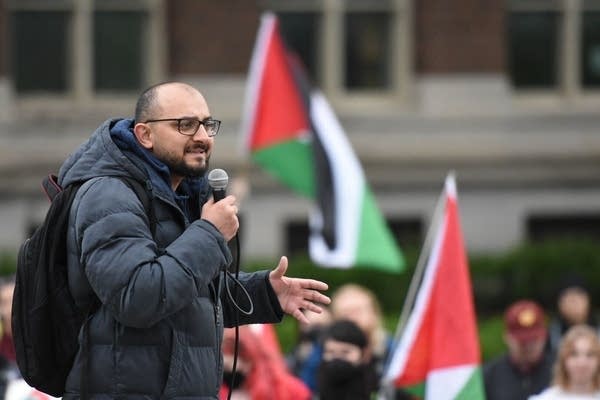 A man speaks to a crowd