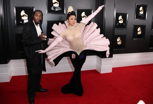 Cardi B wearing a dress on the red carpet.