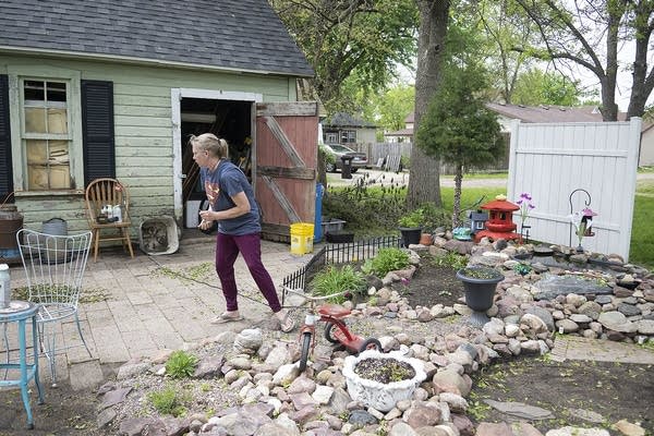 Monica Strand tends to her garden