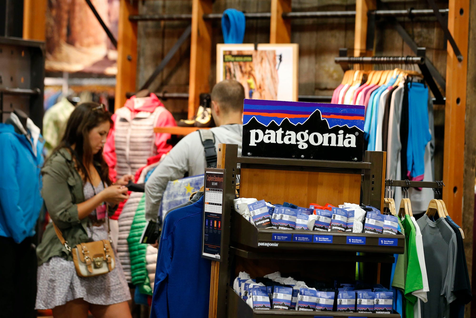 Customers browsing in a Patagonia store.