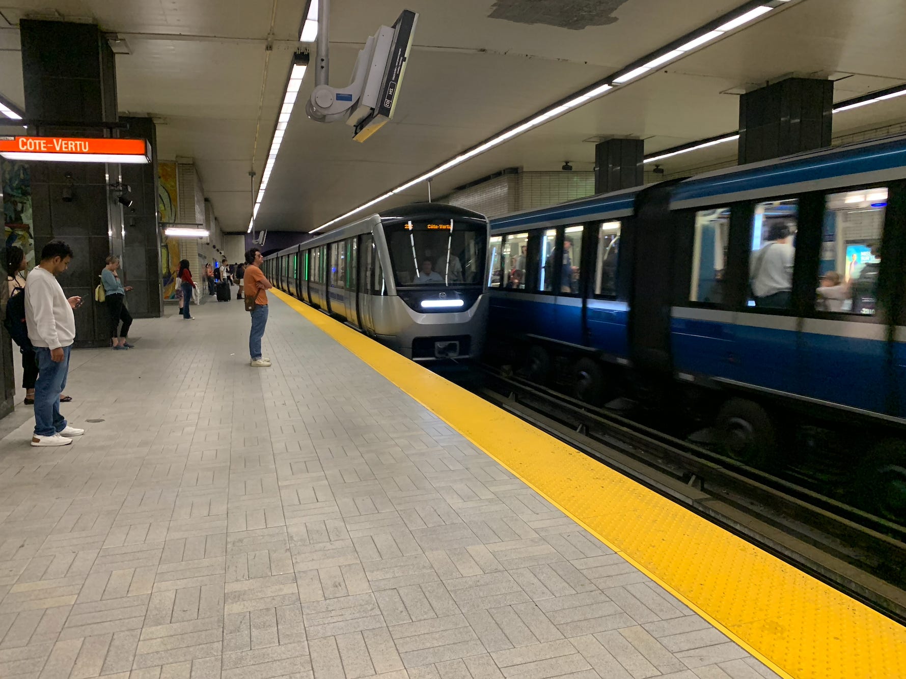 people waiting for the metro in a station in montreal