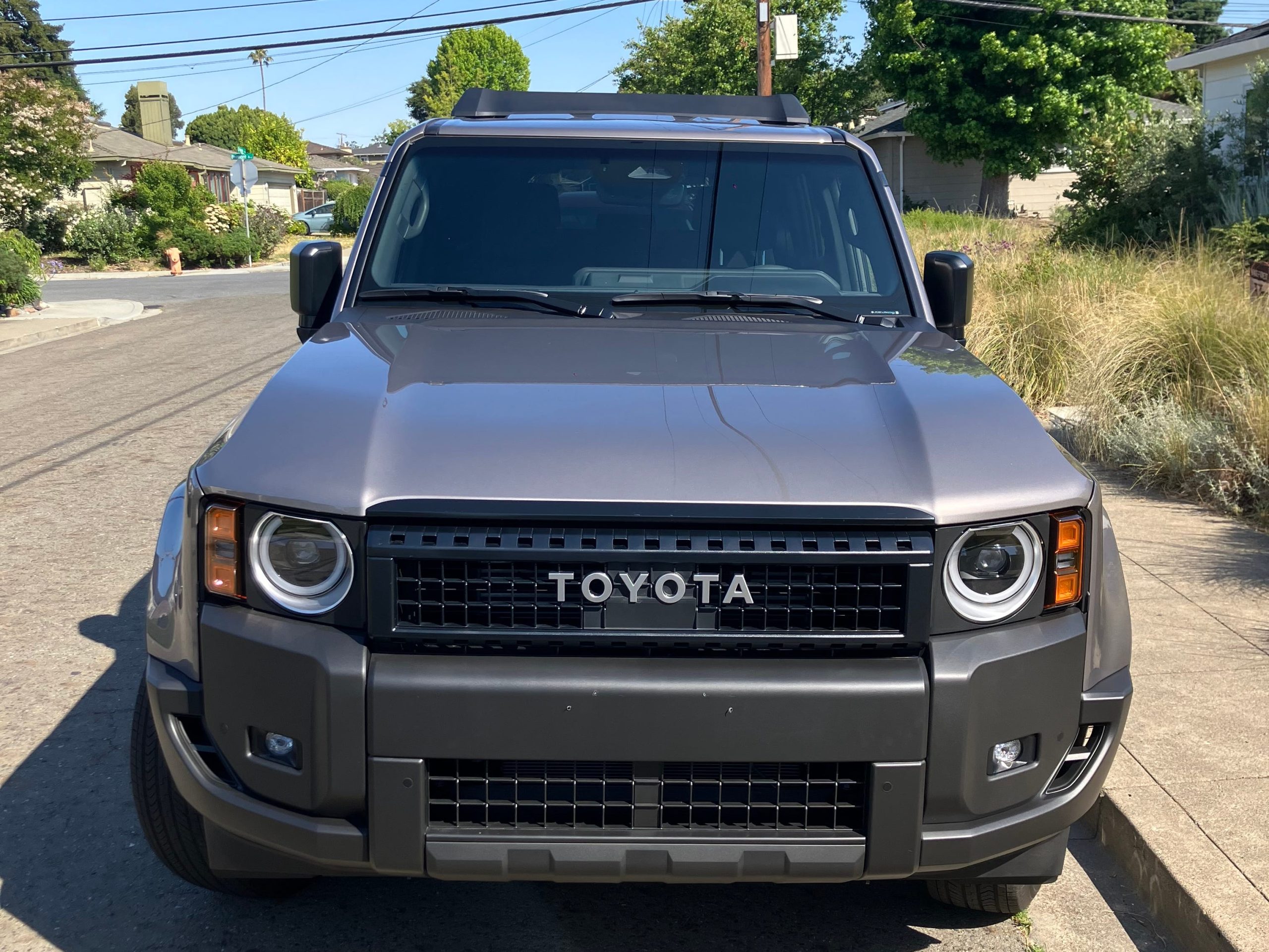 A Toyota Land Cruiser parked on a suburban street in Silicon Valley