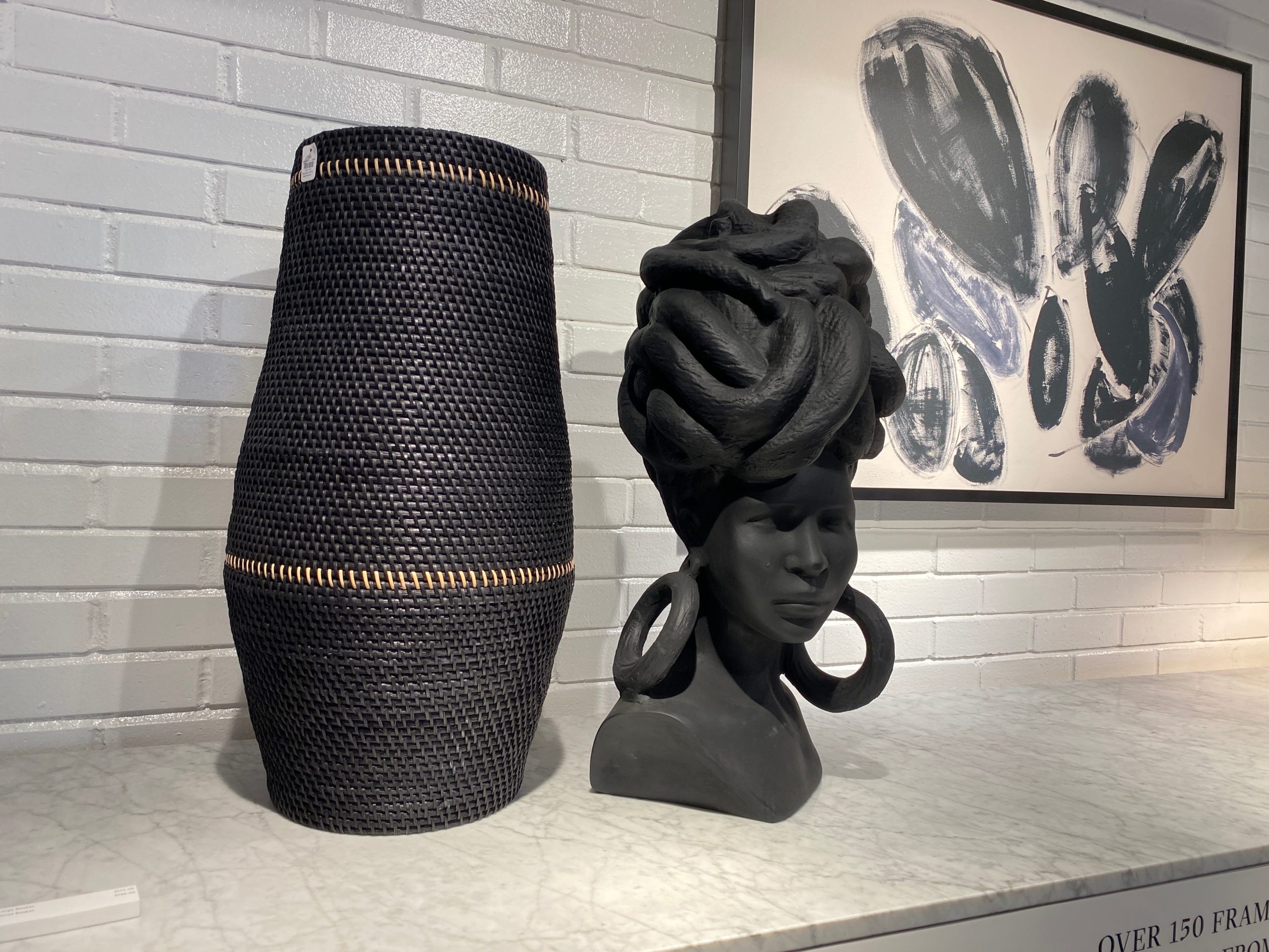 Head statue and black jute-style vase  in CB2