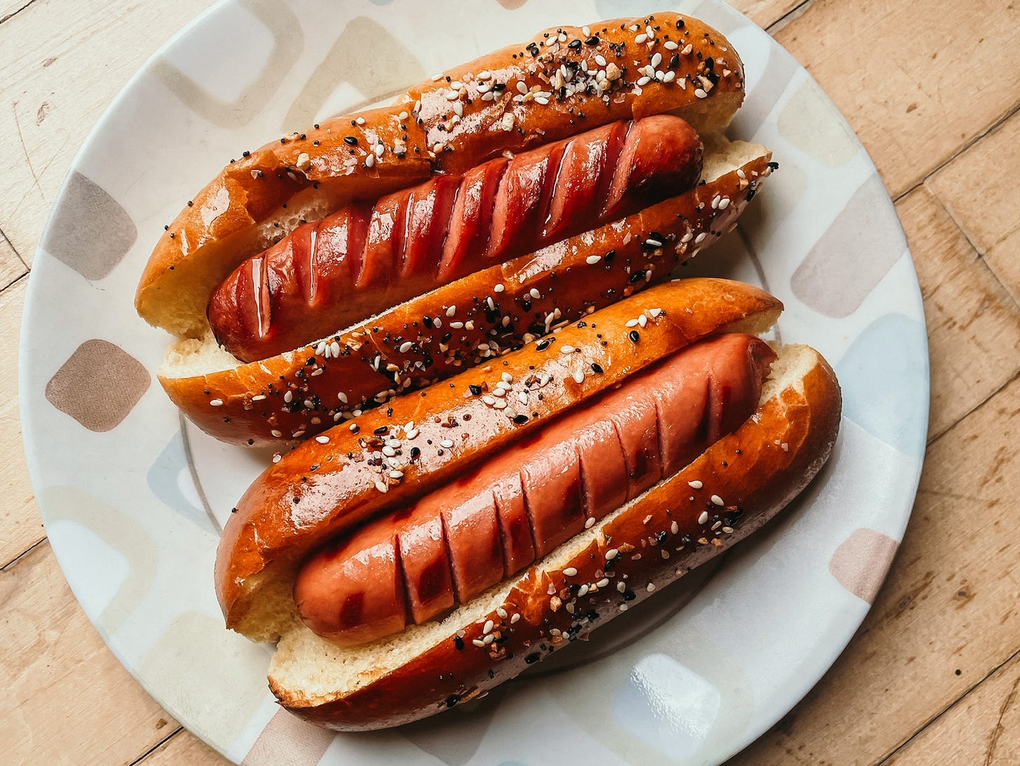 two hot dogs on a plate