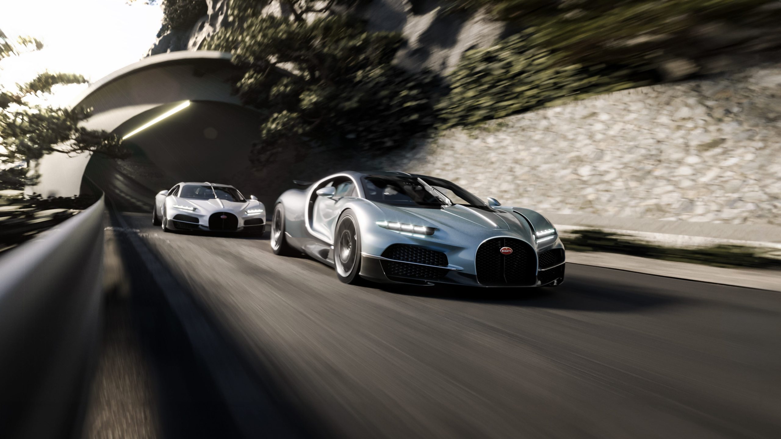 A pair of Bugatti Tourbillon hypercars driving together.