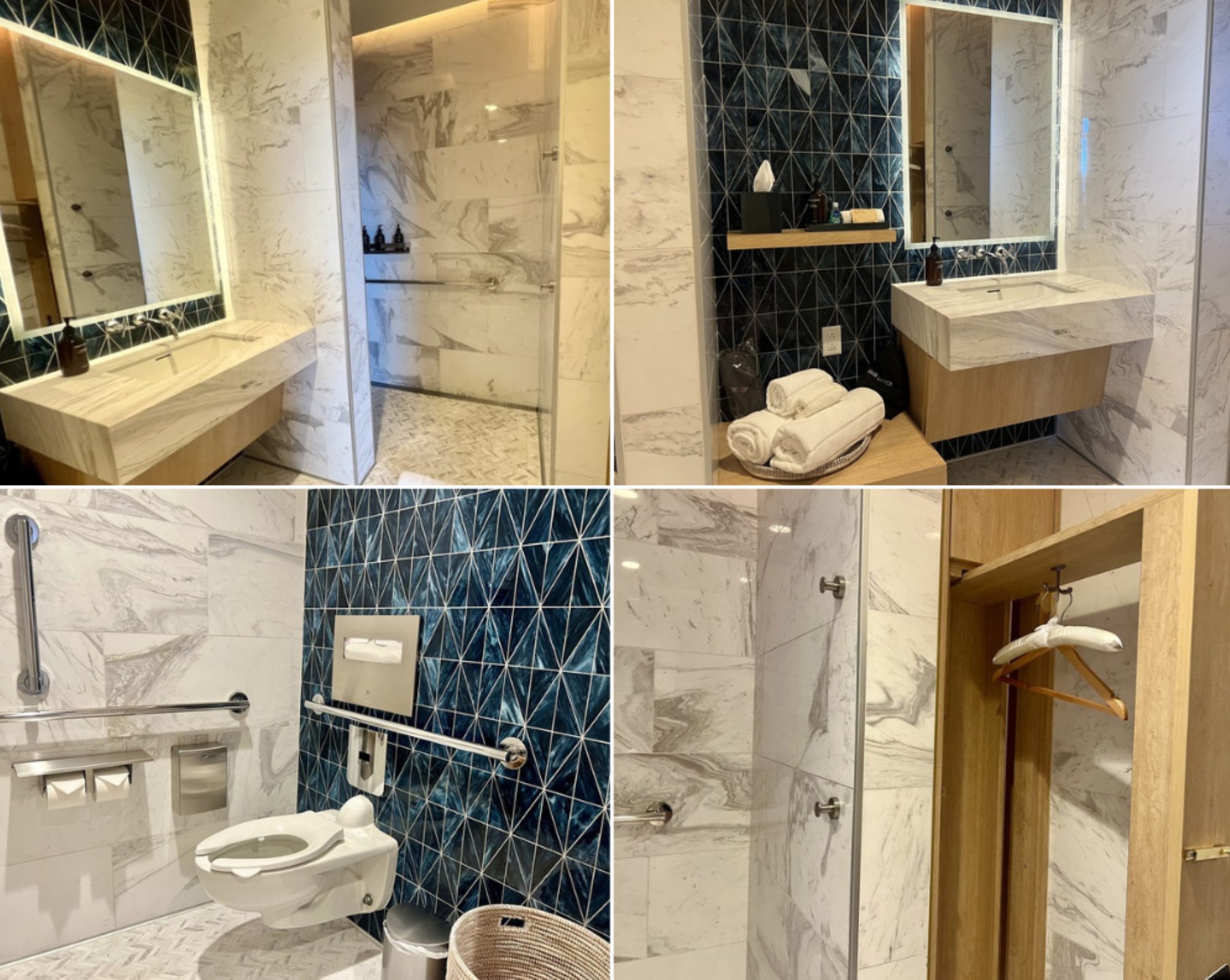 The Delta One Lounge shower with marble looking walls and blue backsplash.