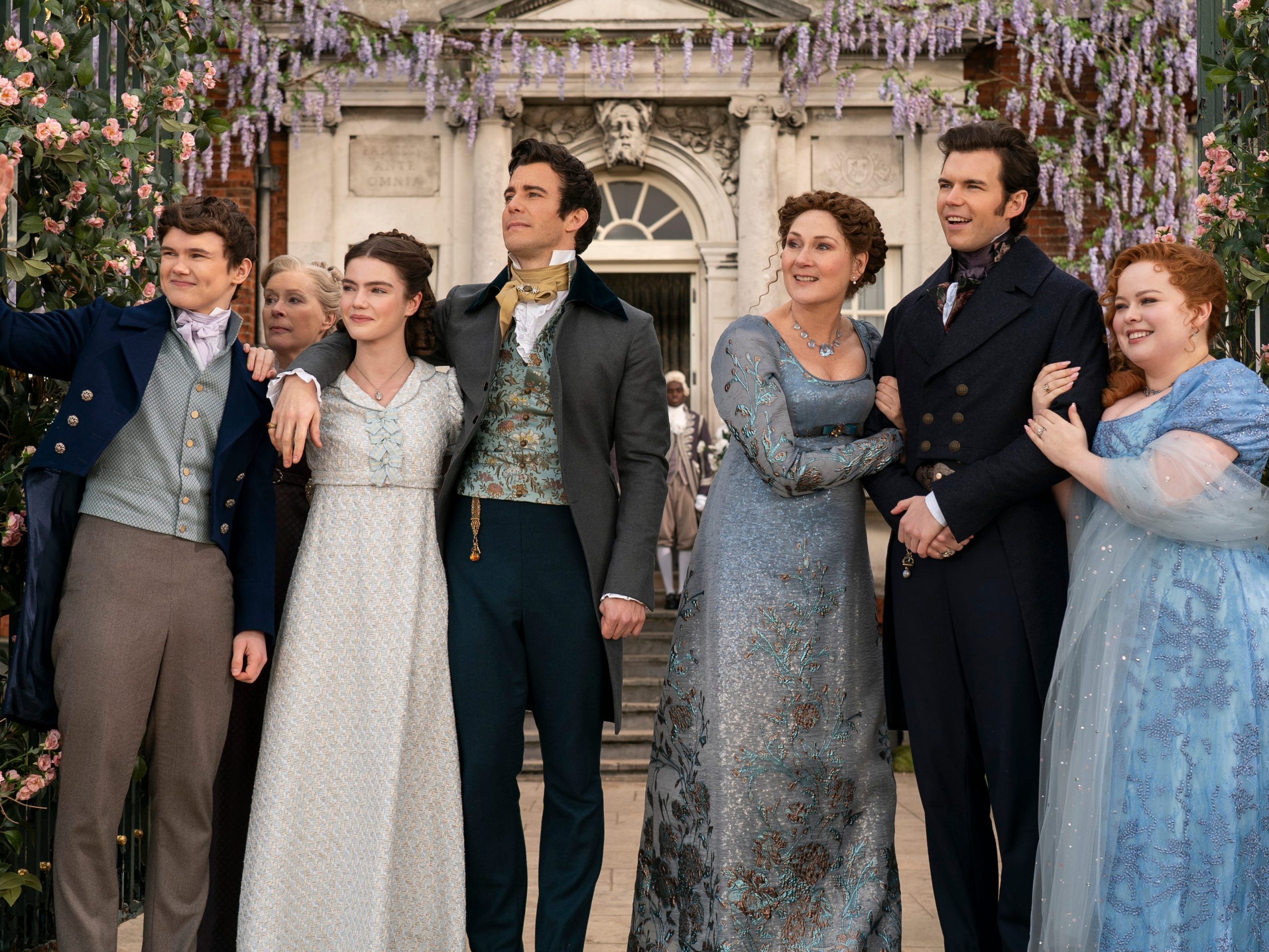 Will Tilston as Gregory Bridgerton, Florence Hunt as Hyacinth Bridgerton, Luke Thompson as Benedict Bridgerton, Ruth Gemmell as Lady Violet Bridgerton, Luke Newton as Colin Bridgerton, and Nicola Coughlan as Penelope Featherington in the season three finale of "Bridgerton."