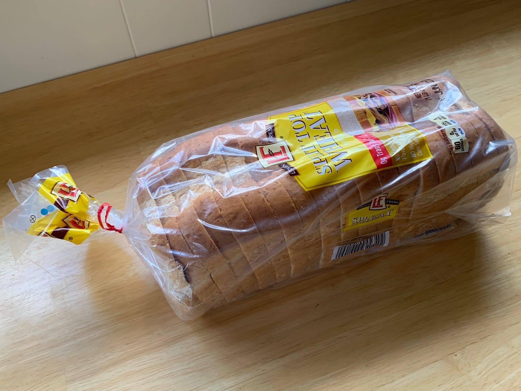 loaf of wheat bread on a kitchen counter