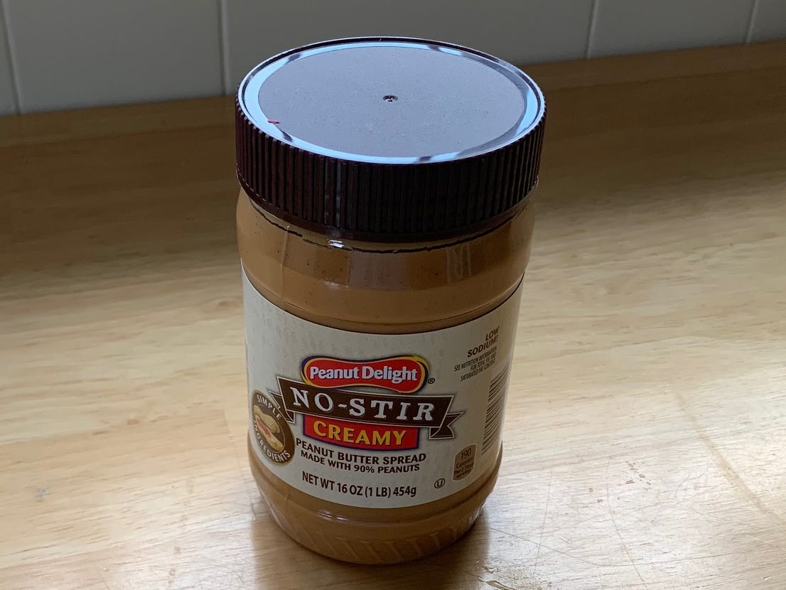 jar of peanut butter on a kitchen counter