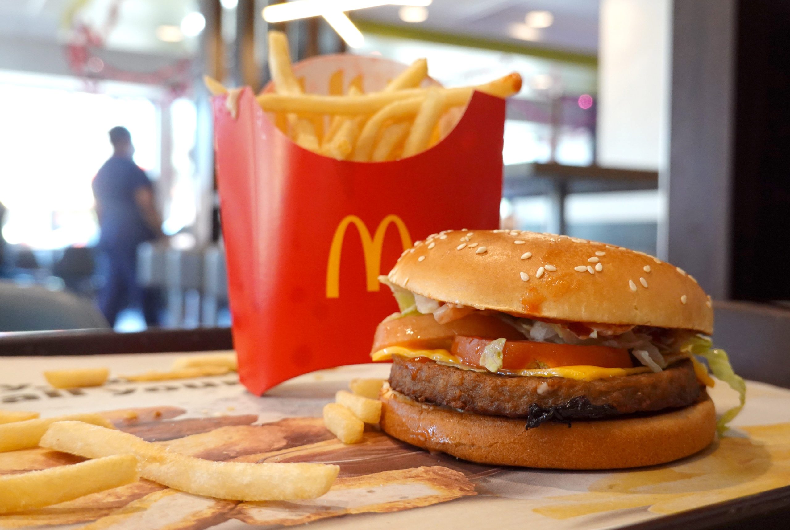 In this photo illustration, a McDonald's McPlant Beyond Meat burger is displayed with french fries at a McDonald's restaurant on February 14, 2022 in San Rafael, California